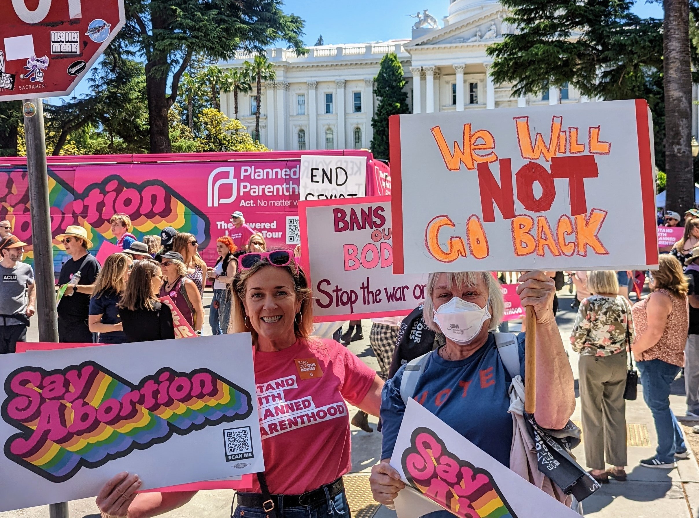Two women at abortion access rally