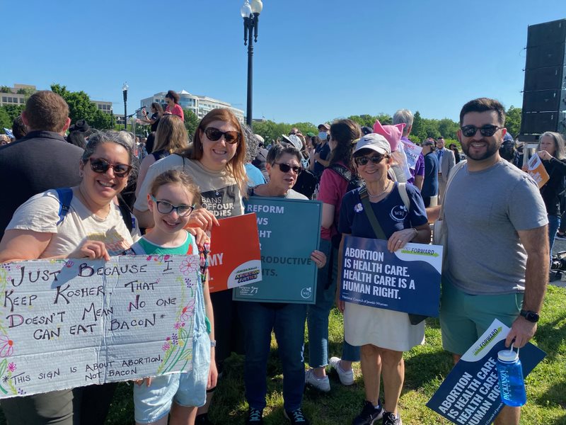 Abortion Justice 2021 Rally Attendees holding signs