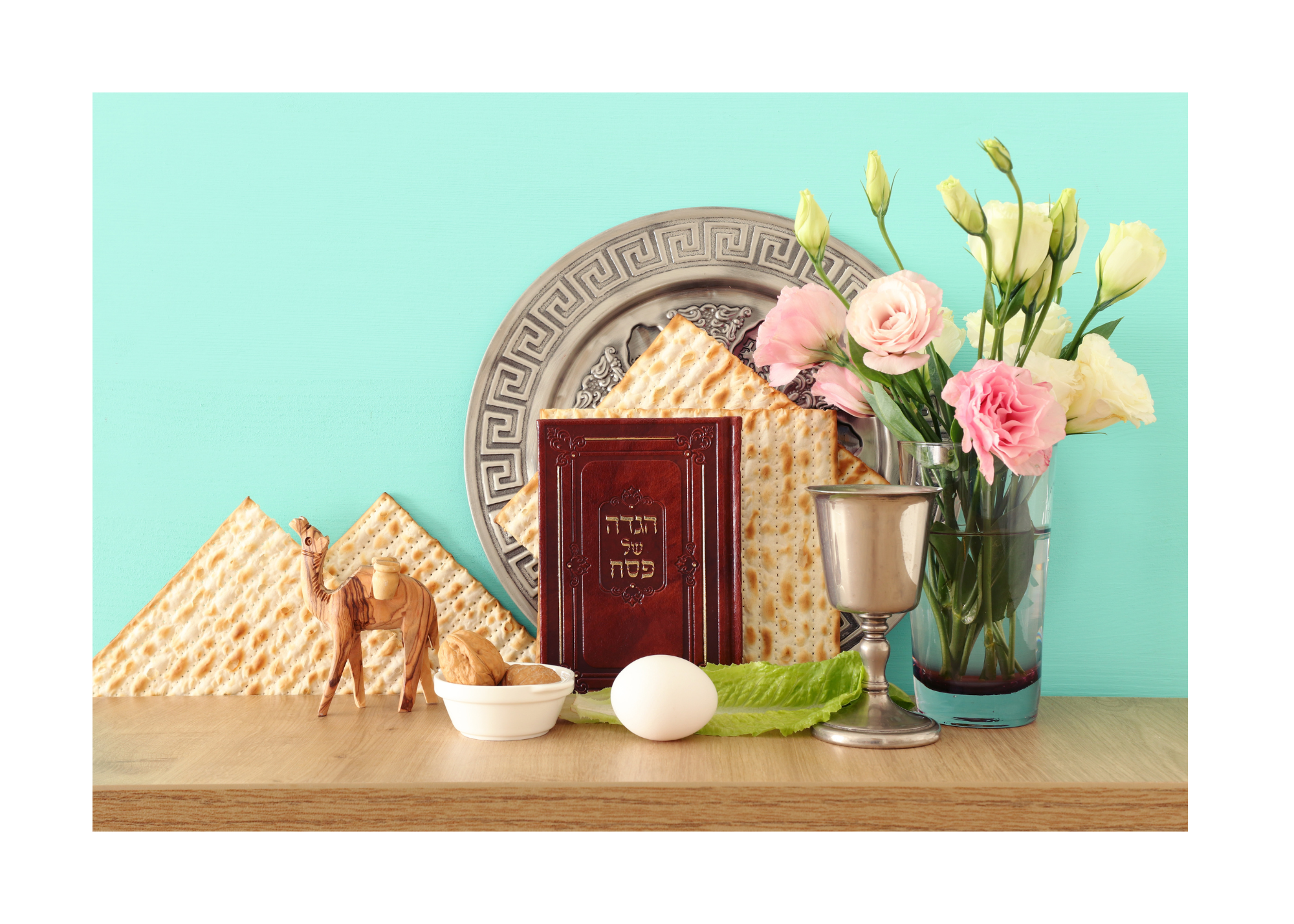 Passover photo with flowers, matzah, seder plate, etc. 